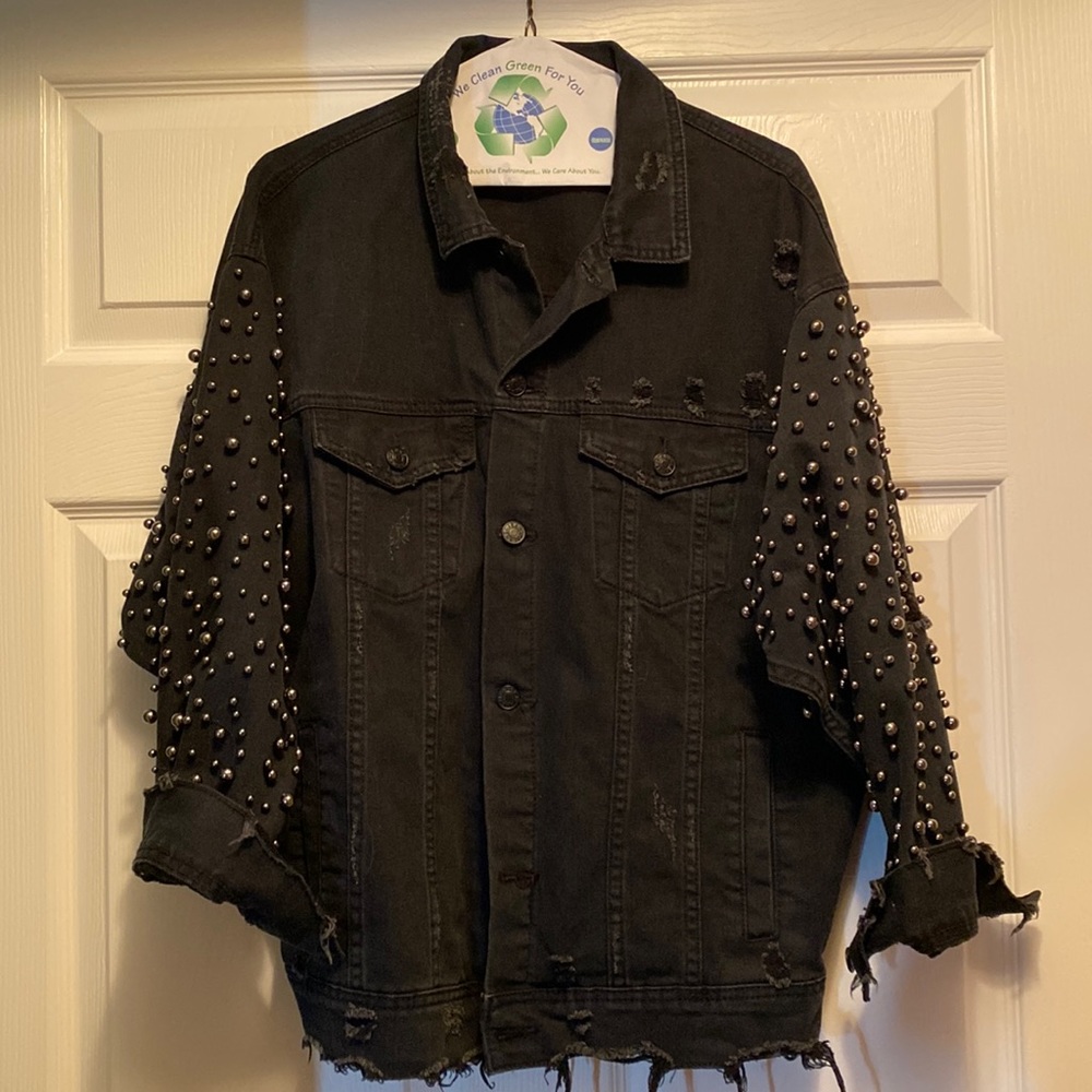 Black oversized distressed denim jacket with studs